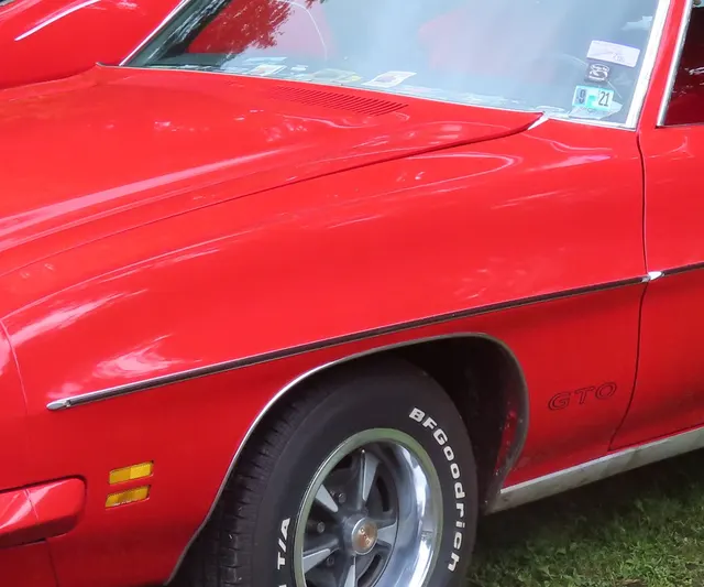 1971 GTO front-end detail crop used for model-year nose and trim context.