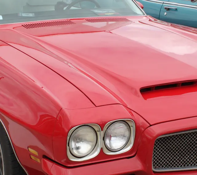 1971 GTO hood-scoop detail crop; Ram Air and 455 HO claims require documentation.