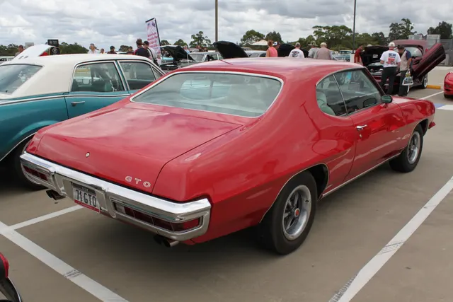 Licensed 1971 Pontiac GTO rear-left view used as exact-year rear trim context only.