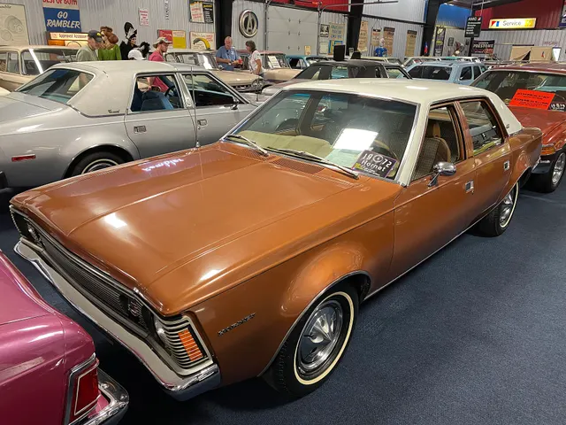 Exact-year view retained for body, trim, glass, lamps, bumpers, and wheel context; condition and restoration details remain specific to the photographed vehicle.