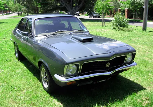 Exact-year 1972 Holden Torana view documenting the body, model trim, glazing, lamps, bumpers, and wheel treatment; visible restoration remains subject-specific.