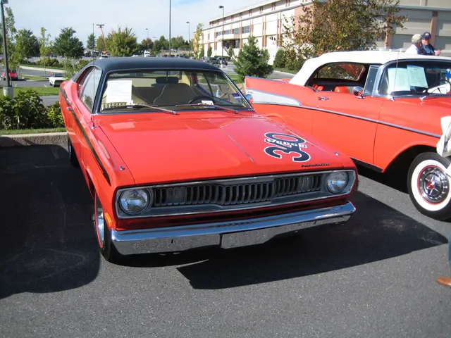 Exact-year Duster 340 front three-quarter view retained for the grille, lamps, hood, fenders, 340 side graphics, wheel covers, glass, bumpers, and stance; paint and current condition remain specific to the photographed car.