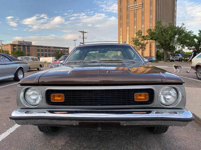 Exact-year front view retained for the recoverable bumper, grille, lamps, hood stamping and script, windshield, roof rack, and wheel-track context; restoration and current tires remain subject-specific.