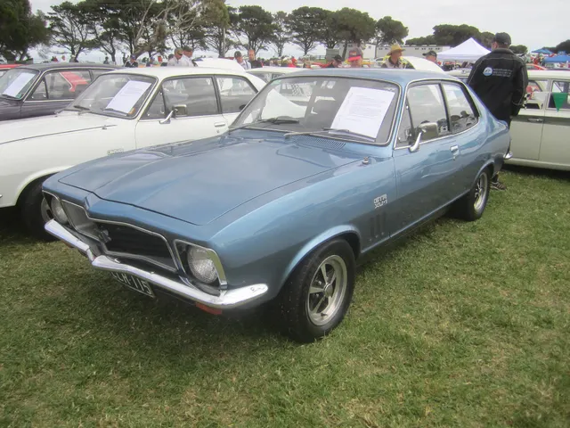 Exact-year 1973 Holden Torana view documenting the body, model trim, glazing, lamps, bumpers, and wheel treatment; visible restoration remains subject-specific.