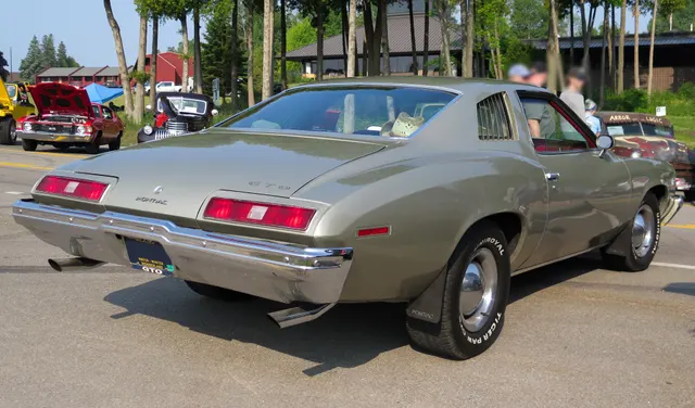 1973 Pontiac GTO in Ascot Silver, rear three-quarter view