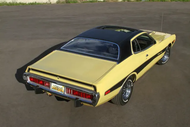 Exact-year view retained for body, trim, glass, lamps, bumpers, and wheel context; condition and restoration details remain specific to the photographed car.