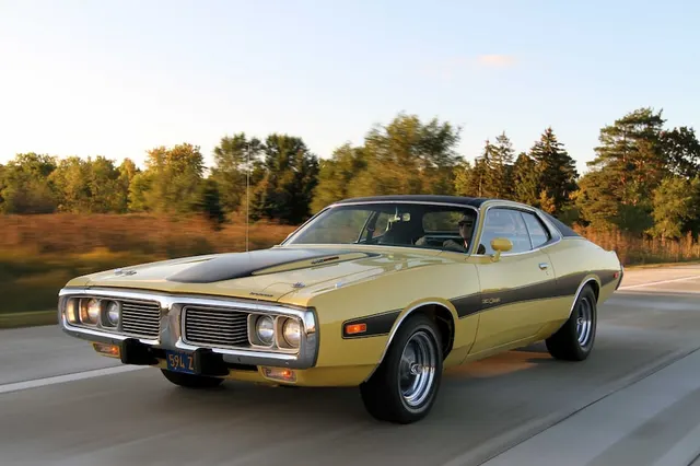 Exact-year view retained for body, trim, glass, lamps, bumpers, and wheel context; condition and restoration details remain specific to the photographed car.