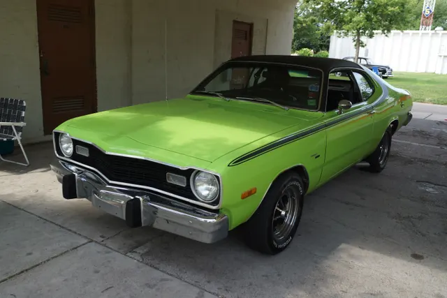 1974 Dodge Dart Sport front view showing the 1974 bumper, grille, coupe roofline, and model graphics