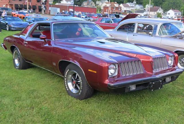 Exact-year view retained for body, trim, glass, lamps, bumpers, and wheel context; condition and restoration details remain specific to the photographed car.