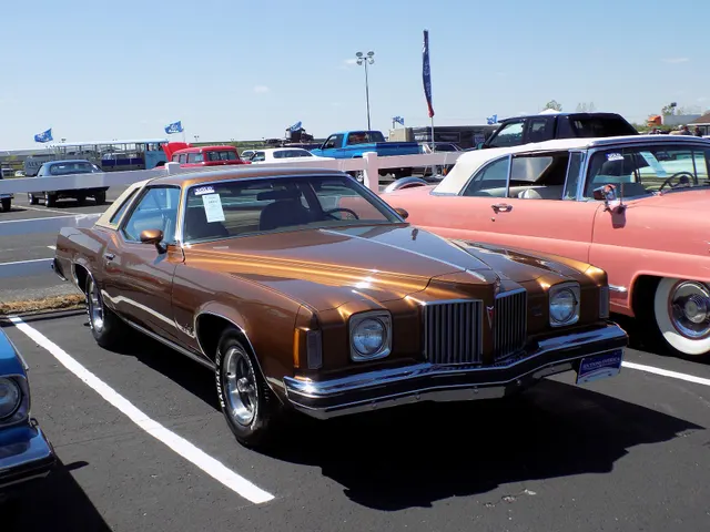 Exact-year SJ side view retained for the K57 roof, quarter windows, long doors, body moldings, package identification, wheel openings, and stance; paint, wheels, tires, and condition remain subject-specific.