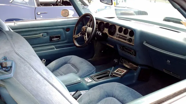 Exact-year Trans Am cabin retained for seats, console, shifter, instruments, dashboard, steering wheel, and trim context; condition remains car-specific.