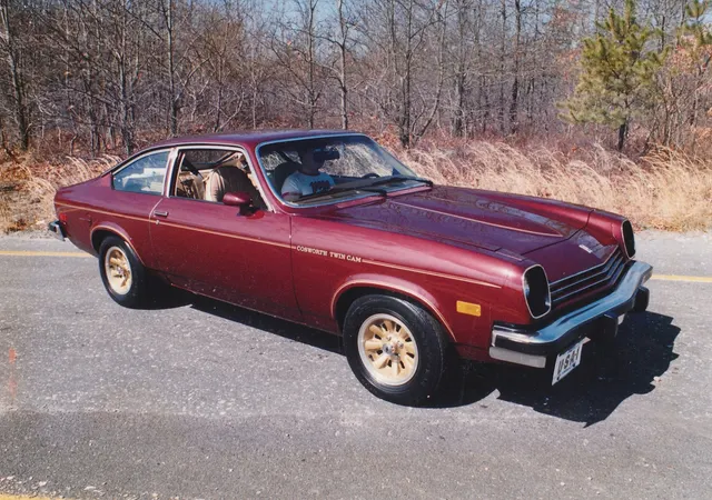 Dark red 1976 Cosworth Vega, front three-quarter view