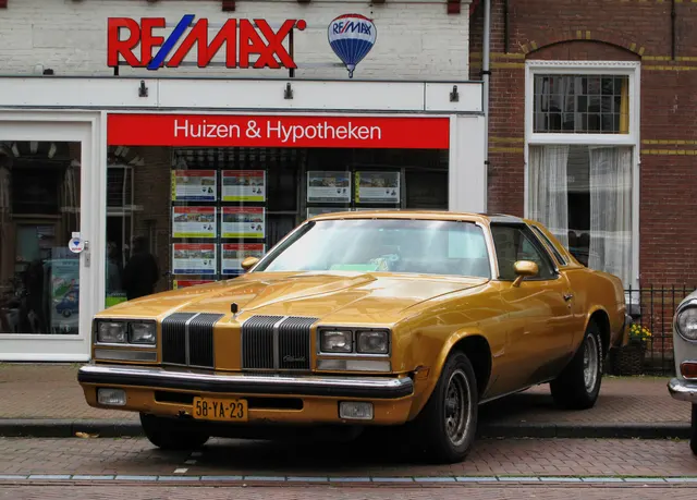 Exact-year view retained for body, trim, glass, lamps, bumpers, and wheel context; condition and restoration details remain specific to the photographed car.