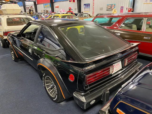 Exact-year view retained for body, trim, glass, lamps, bumpers, and wheel context; condition and restoration details remain specific to the photographed vehicle.