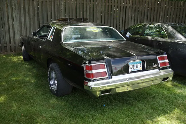 Exact-year view retained for body, trim, glass, lamps, bumpers, and wheel context; condition and restoration details remain specific to the photographed vehicle.