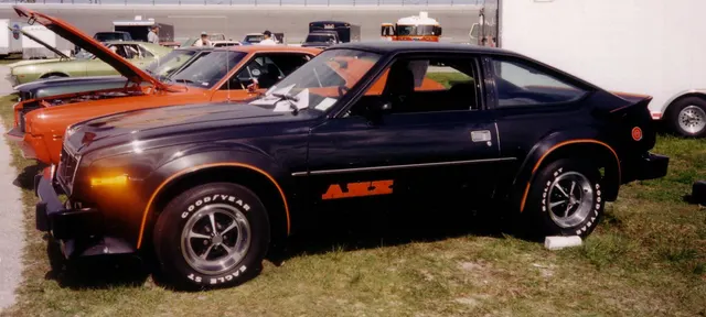 Exact-year view retained for body, trim, glass, lamps, bumpers, and wheel context; condition and restoration details remain specific to the photographed vehicle.