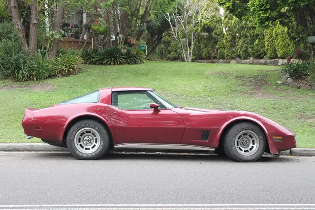 Exact-year profile retained for body proportions, removable roof, fastback glass, fender vent, rocker trim, and factory-style wheel context; paint wear, tires, and condition remain subject-specific.