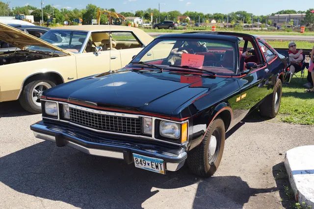 Exact-year view retained for body, trim, glass, lamps, bumpers, and wheel context; condition and restoration details remain specific to the photographed vehicle.