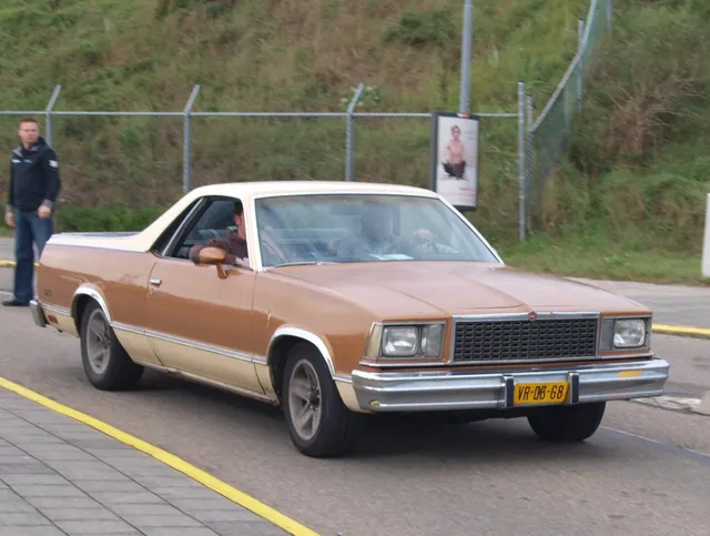 Exact-year view retained for body, trim, glass, lamps, bumpers, and wheel context; condition and restoration details remain specific to the photographed vehicle.