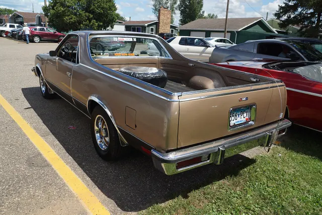 Exact-year view retained for body, trim, glass, lamps, bumpers, and wheel context; condition and restoration details remain specific to the photographed vehicle.