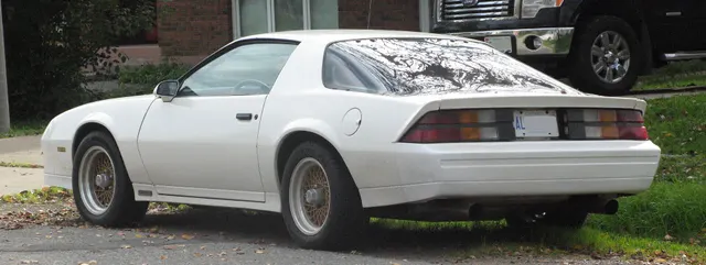 Exact-year view retained for body, trim, glass, lamps, bumpers, and wheel context; condition and restoration details remain specific to the photographed vehicle.