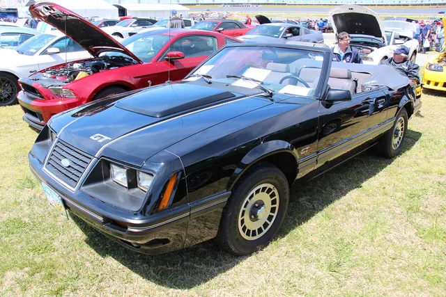 Exact-year Turbo GT convertible retained for the rare turbocharged power-team and convertible-body combination, exterior identification, trim, top, body, and wheel context; badges do not replace drivetrain and record evidence.