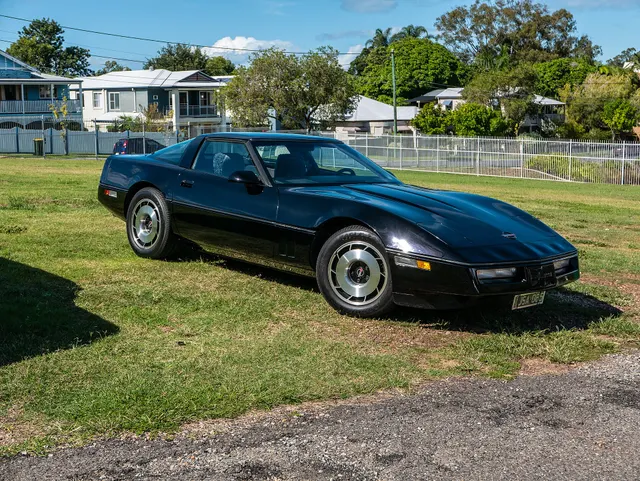 Exact-year view retained for body, trim, glass, lamps, bumpers, and wheel context; condition and restoration details remain specific to the photographed car.
