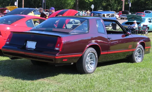 Exact-year SS Aerocoupe rear three-quarter view retained for the compound rear glass, short deck, spoiler, lamps, bumper, SS graphics, factory wheels, and stance; the Aerocoupe body and current condition remain specific to this variant and car.