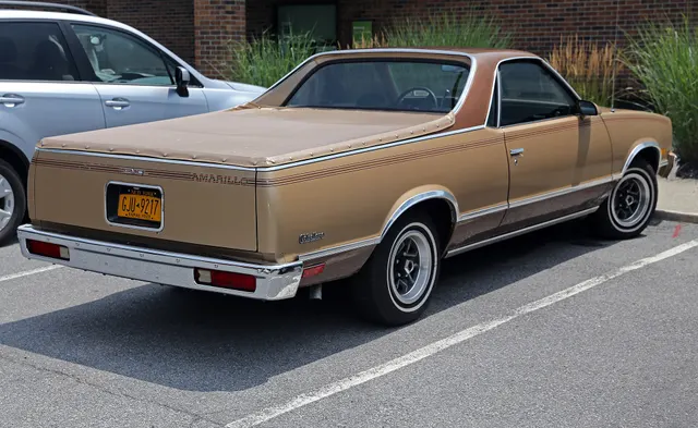 Exact-year view retained for body, trim, glass, lamps, bumpers, and wheel context; condition and restoration details remain specific to the photographed vehicle.