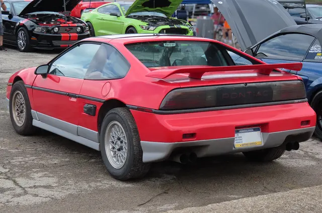 Exact-year view retained for body, trim, glass, lamps, bumpers, and wheel context; condition and restoration details remain specific to the photographed vehicle.