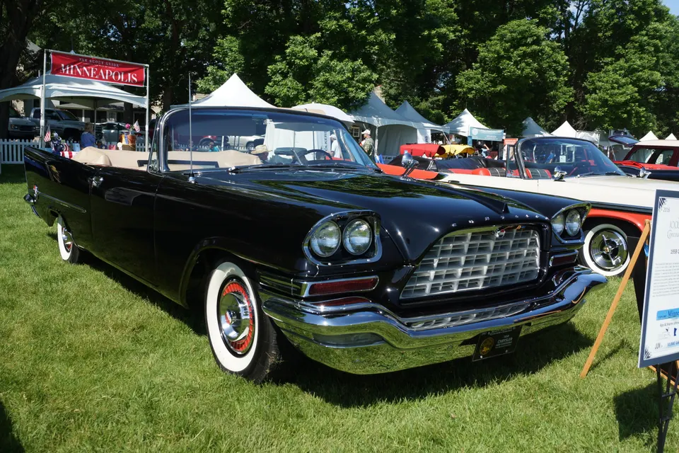 Forward Look body with compound-curved windshield and egg-crate grille profile photo