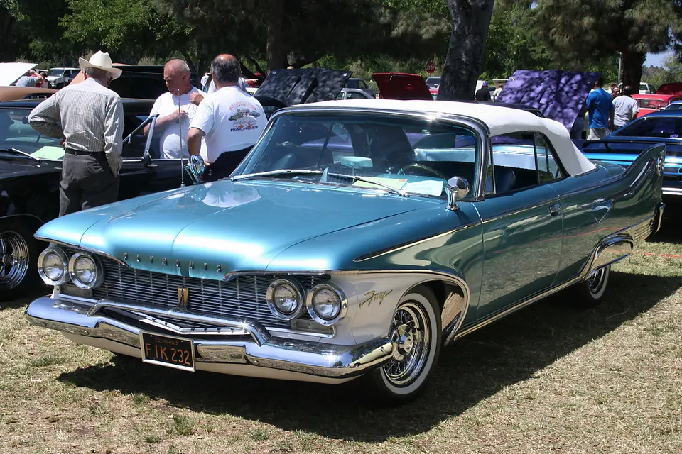 Fury scripts in the front-fender coves and large circular tail-fin medallions profile photo
