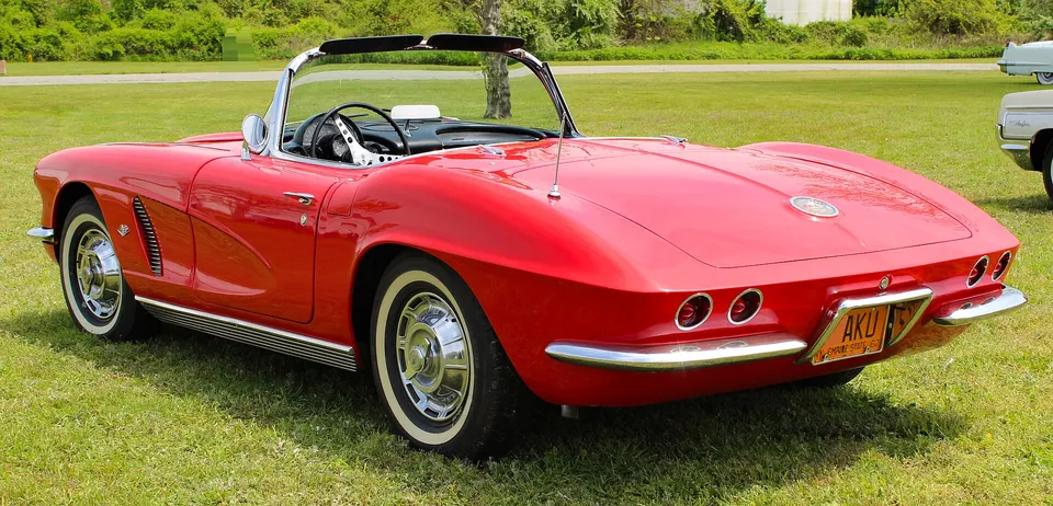 Optional heater, signal-seeking AM radio, power windows, power top, and auxiliary hardtop profile photo