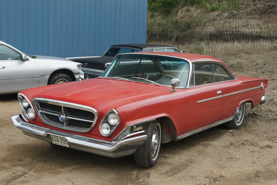 Red-white-blue 300 medallions with a small chrome H following the deck-lid 300 numerals profile photo