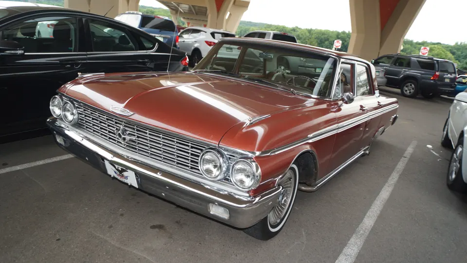Color-keyed carpeting, door panels, instrument panel, and headliner profile photo