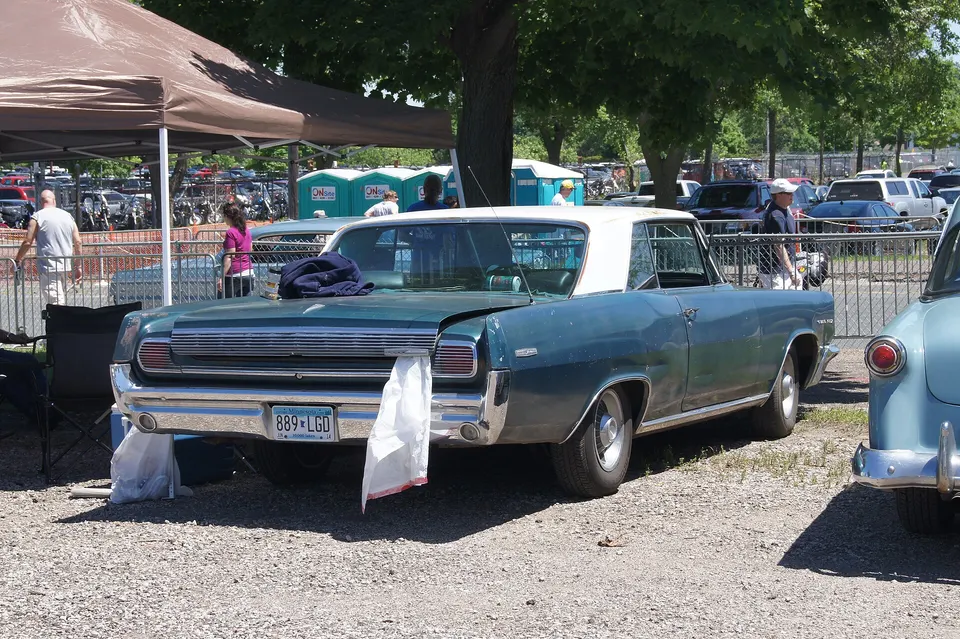 1963 Pontiac grille, lamp, bumper, side-molding, and rear treatment profile photo