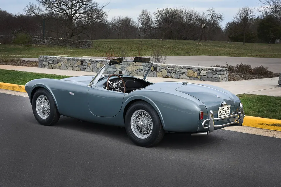 Hand-formed AC aluminum two-seat roadster body profile photo