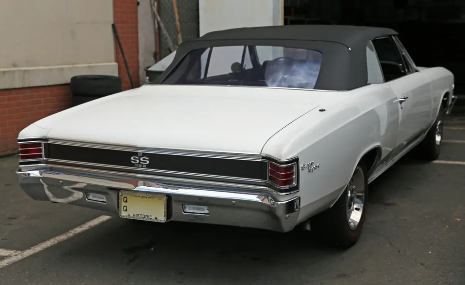 Blacked-out grille, headlamp bezels, grille extensions, and rear cove profile photo
