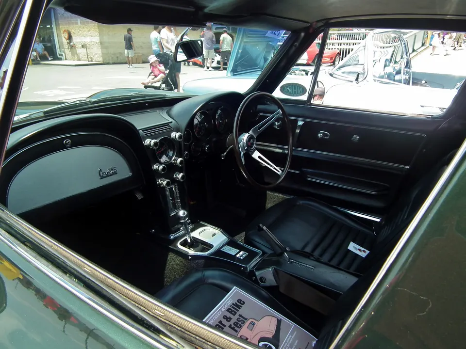 Passenger grab handle deleted; optional radio, power windows, air conditioning, tinted glass, headrests, and shoulder belts profile photo