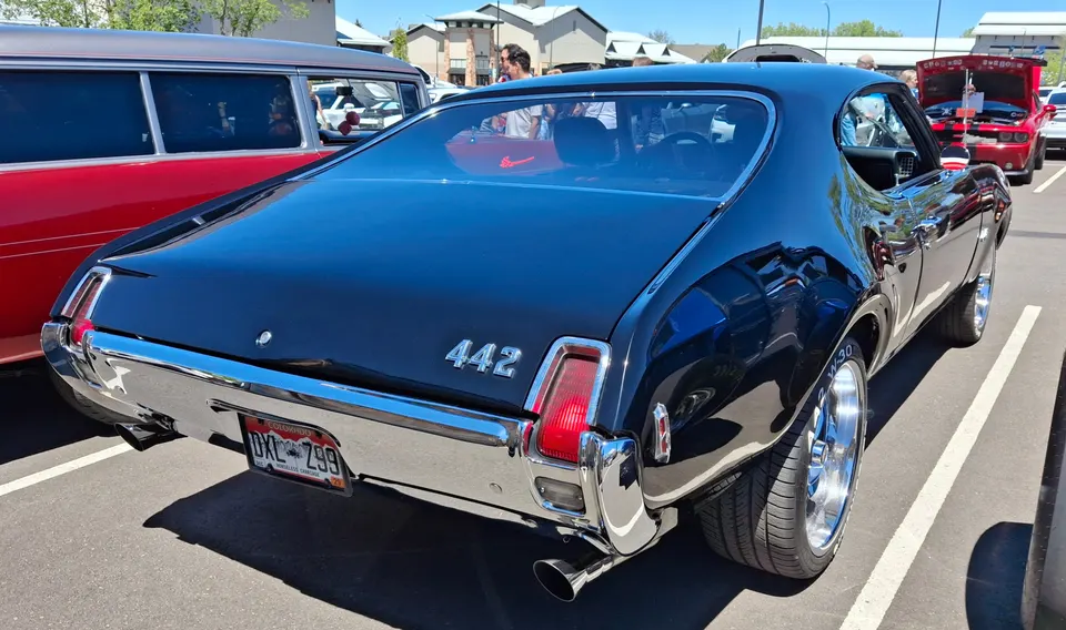 Cutout rear bumper and stainless trunk trim profile photo