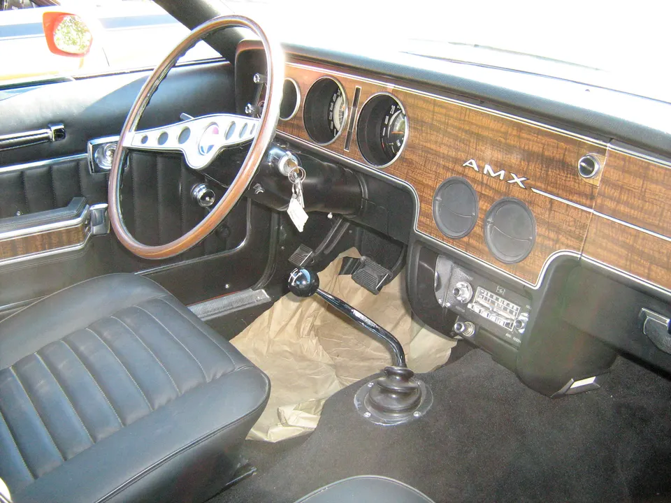 Leather upholstery was optional; standard trim and color should be checked on the door data plate profile photo