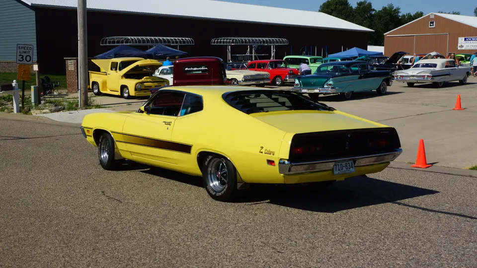 Staggered rear-shock context on four-speed performance cars profile photo